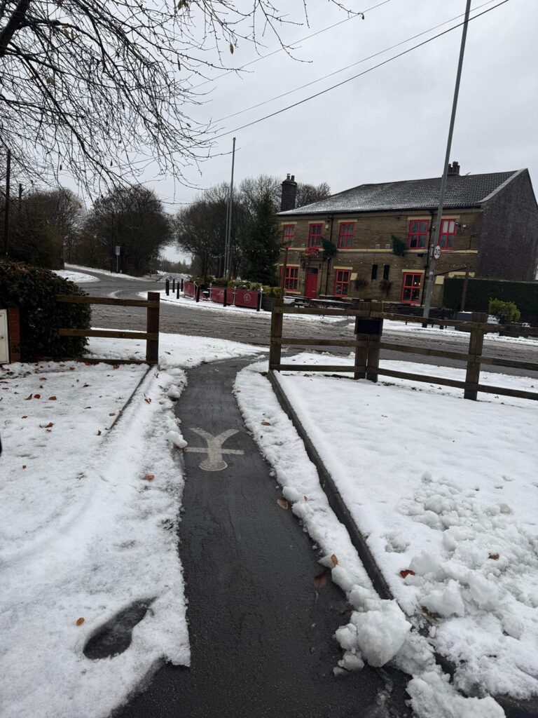 Bradford Snow Clearance and Gritting Near the Railway Pub, Drighlington – Bawcro Winter Services - Bawcro Snow & Gritting Services Ltd Snow Cleared Footpath Near the Railway Pub in Drighlington Near Bradford After Gritting Work by Bawcro to Improve Winter Road and Pedestrian Safety.